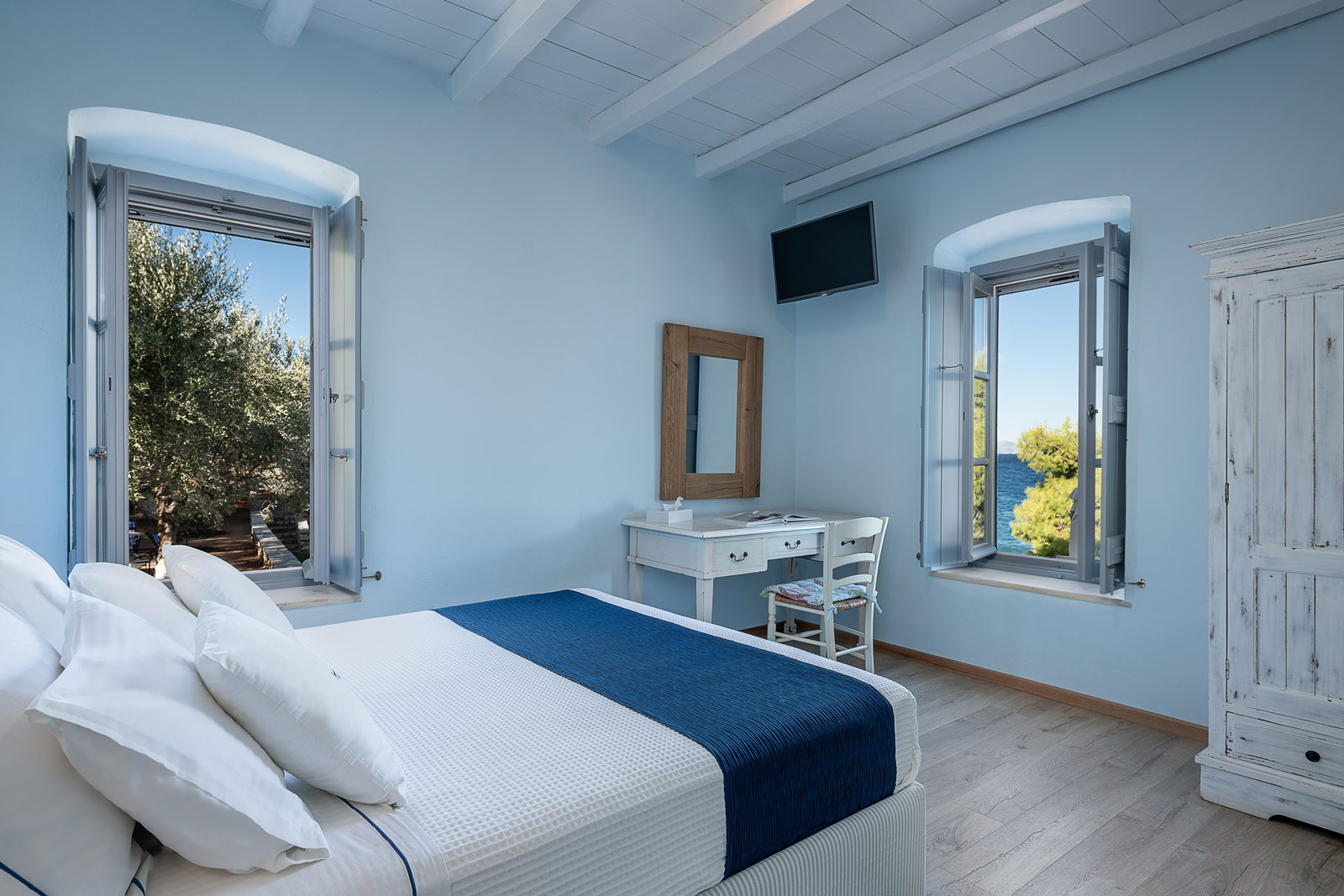 Summer suite bedroom and sea view from two windows.